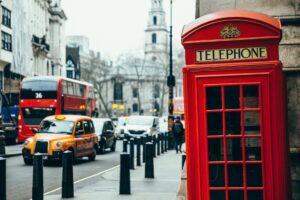 red telephone booth and bus in London